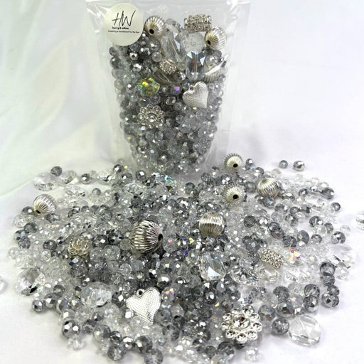 Silverado packed full of beautiful beads and crystal features, silver metal balls, silver and clear glass rondels, crystal glass shapes, contains hundreds of beads, weighs approximately 238g