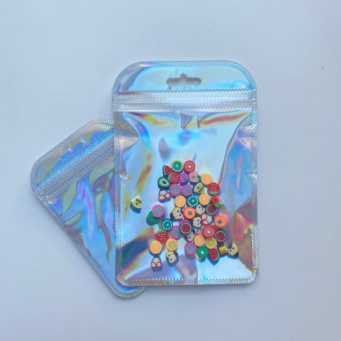 Funky Silver Holographic Bag - Transparent Face (100pcs) (11cm*17cm) - Harry & Wilma