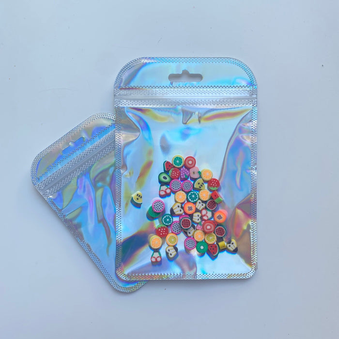 Funky Silver Holographic Bag - Transparent Face (100pcs) (8.5*13cm) - Harry & Wilma