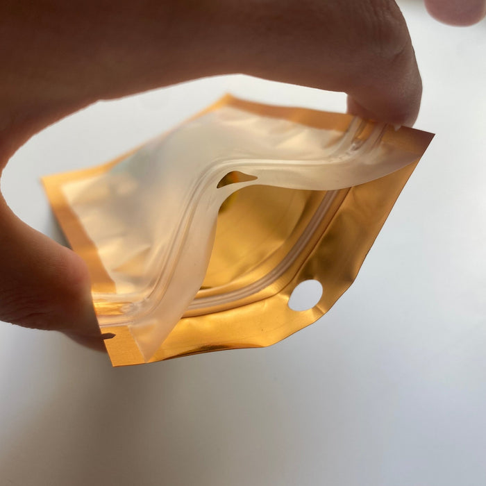 Gold Eye Catching Foil Bag - Transparent Face (100pcs) (8*13cm) - Harry & Wilma